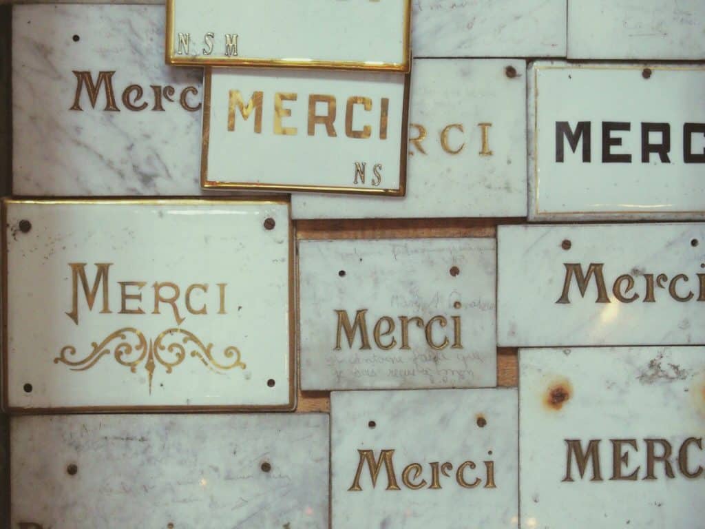 Merci writing on marble in church, France (2014-09)