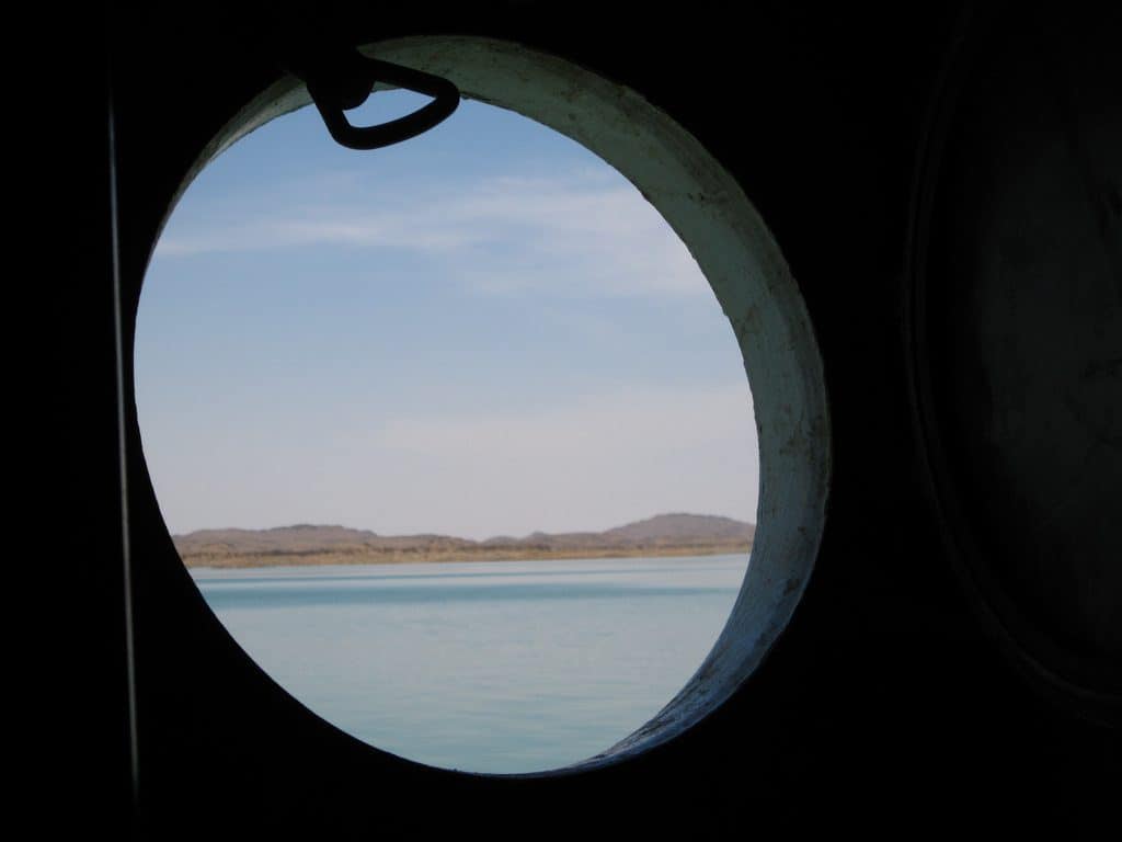 Looking out of the boat window while crossing Lake Aswan from Sudan to Egypt (2012-07)