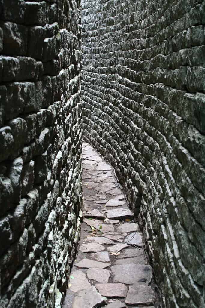 Grey, narrow walls at Great Zimbabwe ruins (2012-03-31)