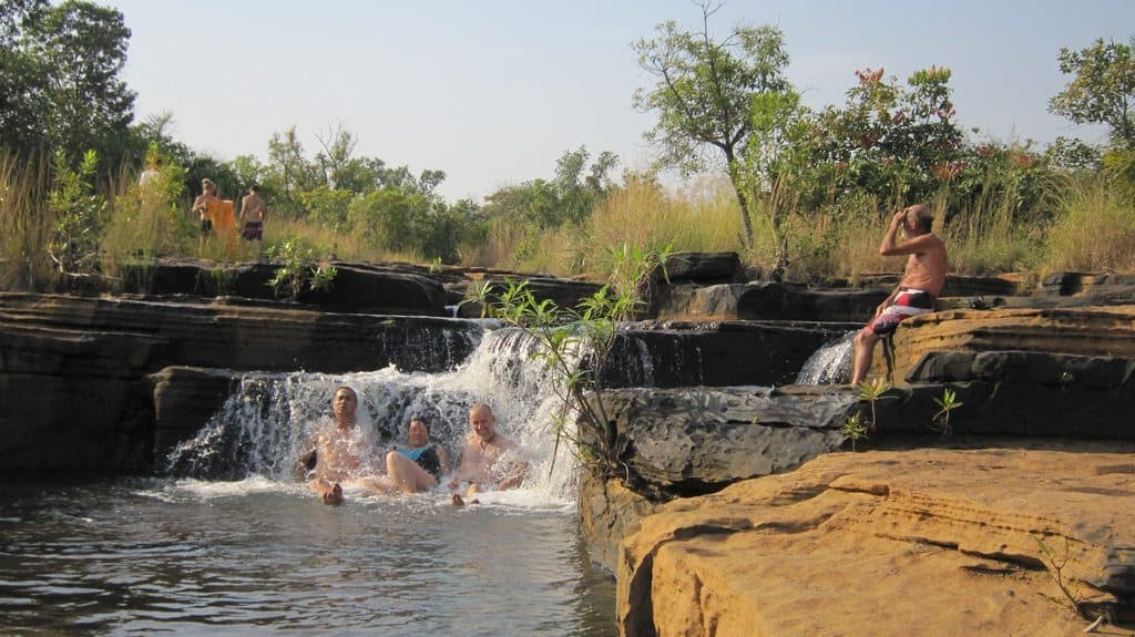 African Trails group bathing in Karfiguela Falls, Burkina Faso (2011-12)