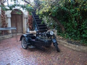 Vintage motorcycle outside Al-Pasha Turkish bath, Amman, Jordan (2016-12-19)