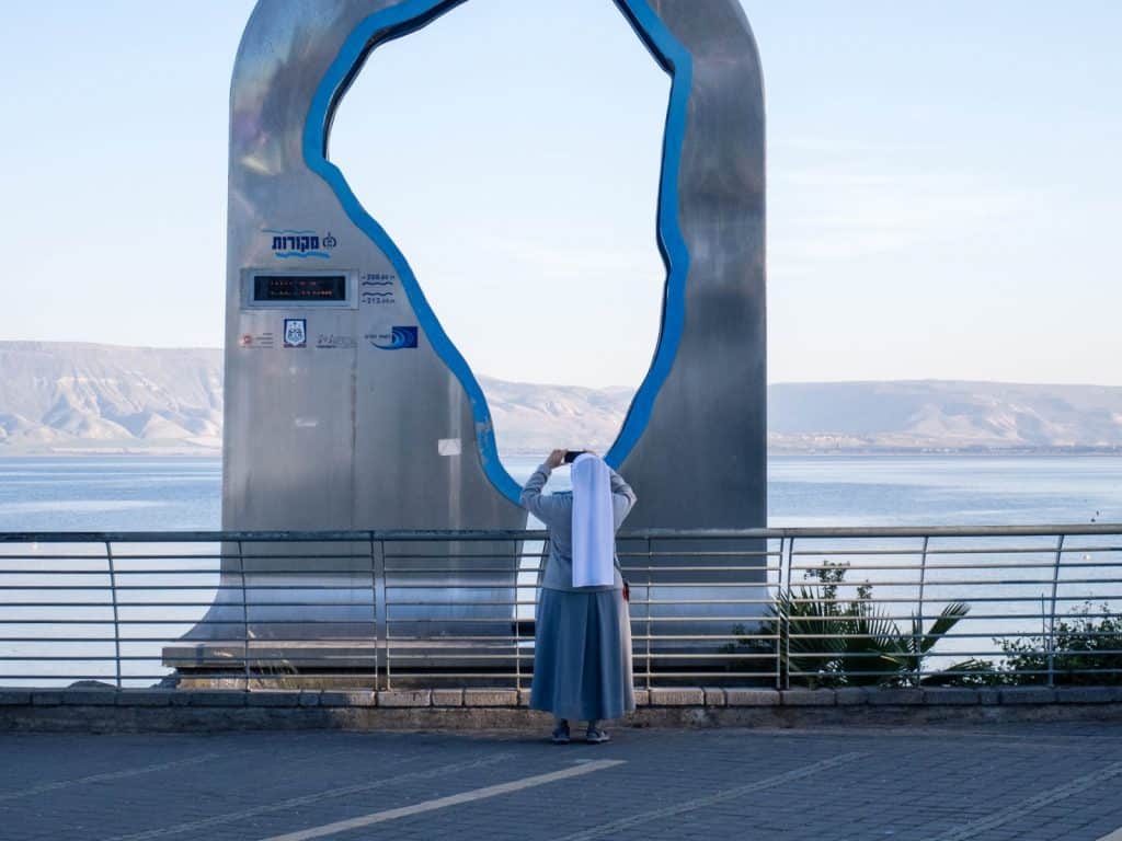 Nun taking a picture, Tiberias, Sea of Galilee, Israel (2017-01-23)