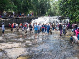 Carola and a waterfall, Kulen National Park, Siem Reap, Cambodia (2017-04-12)