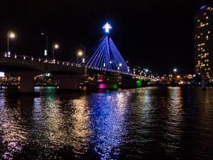 Lights on the bridge at night by the river, Da Nang, Vietnam (2017-06)