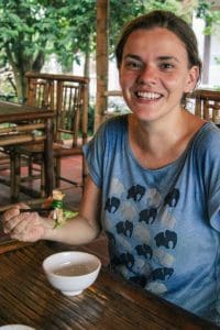 Carola eating Three Friends on Hoi An food tour