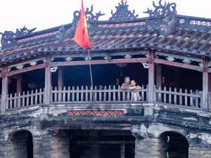 Couple on Japanese Bridge at sunrise, Hoi An, Vietnam (2017-05/06)