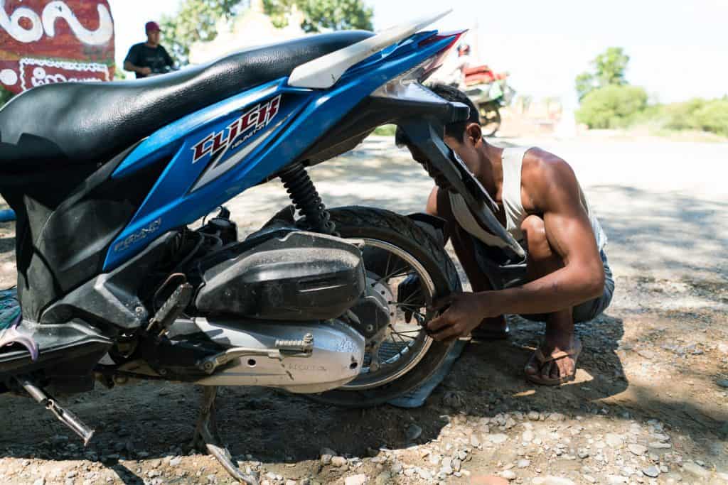 My bike tire being fixed after leaving Inwa, Mandalay, Myanmar (2017-09)