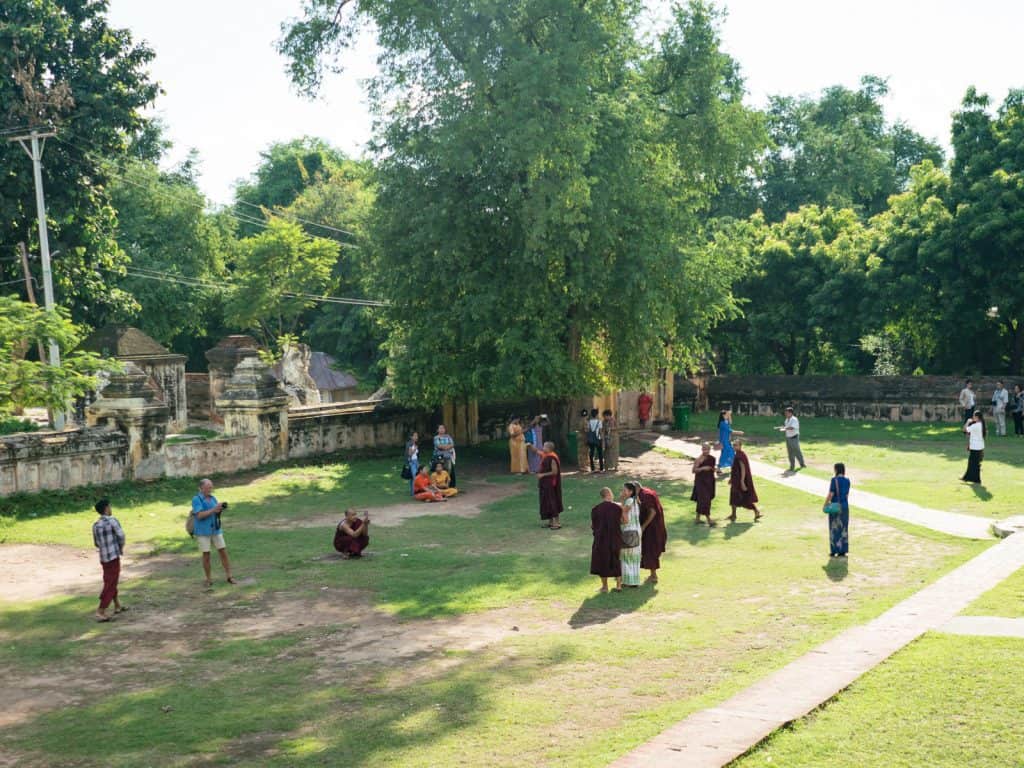 Monks taking pictures in Mae Nu Oak Kyaung (Brick Monastery), Innwa, Mandalay, Myanmar (2