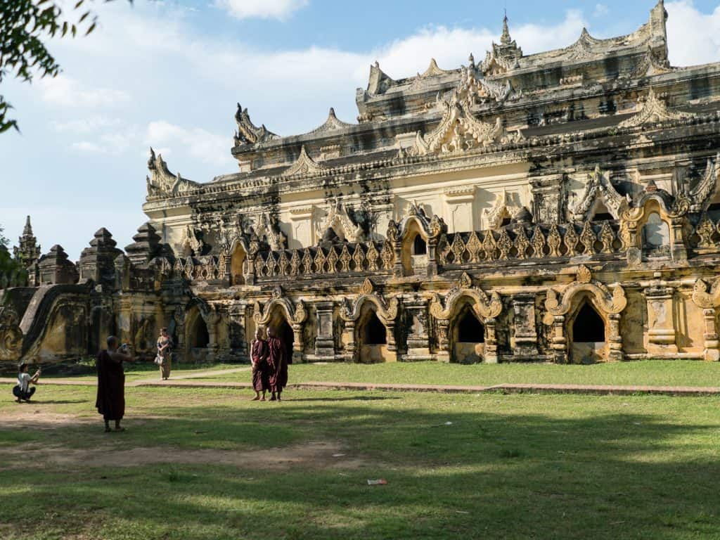 Monks taking pictures at Mae Nu Oak Kyaung (Brick Monastery), Inwa, Mandalay, Myanmar (2017-09)