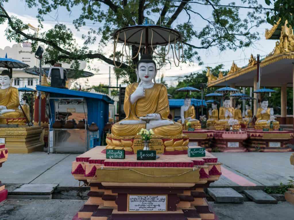 Hand signs at the Skinny Buddha, Mandalay, Myanmar (2017-09)