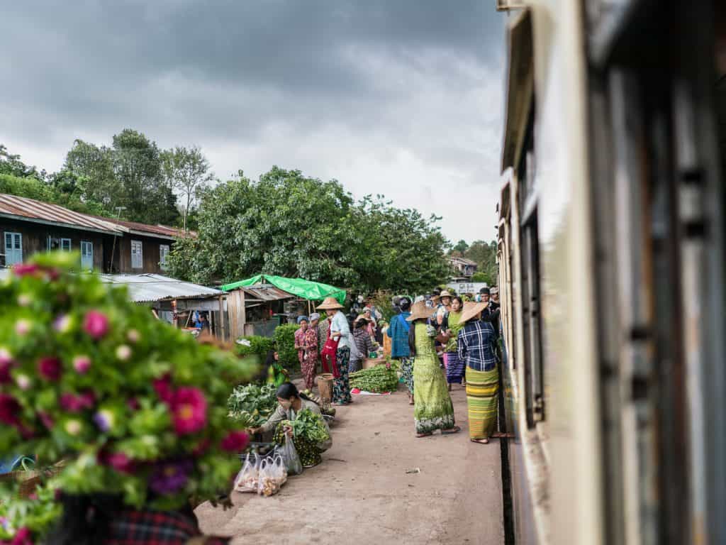 Myanmar train travels: Market at the train stations on the slow train Shwenyaung (Inle Lake) to Thazi, Myanmar (2017-10)