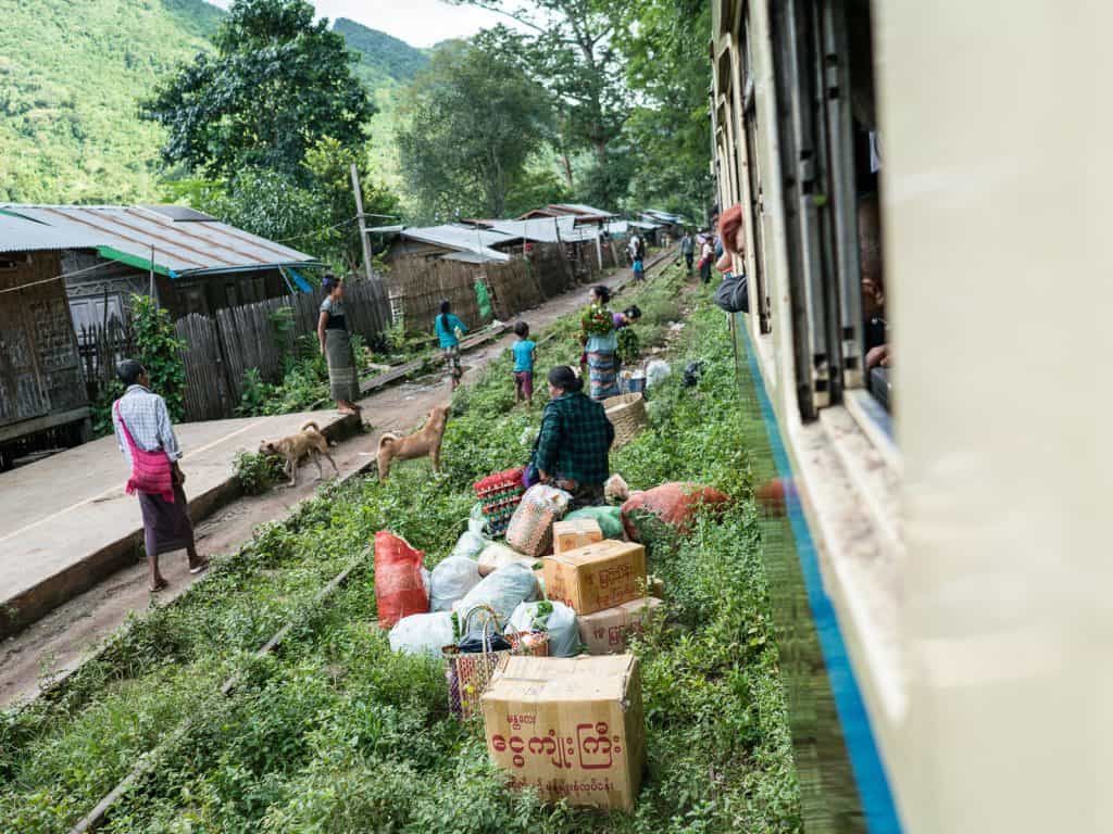 Myanmar train travels: People getting off the slow train Shwenyaung (Inle Lake) to Thazi, Myanmar (2017-10)