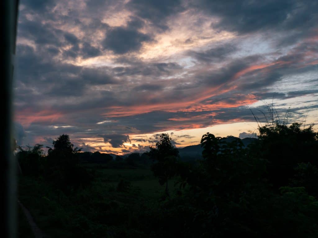 Myanmar train travels: Sunset from the slow train Shwenyaung (Inle Lake) to Thazi, Myanmar (2017-10)