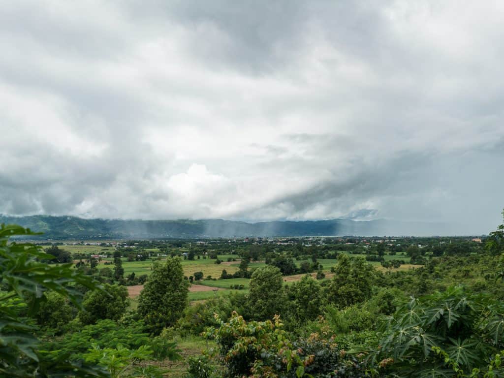 Inle Lake bike tour: View with rain from Red Mountain Vineyard, Myanmar (2017-10)