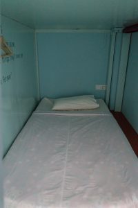 Pod-style dorm bed at Song of Travel hostel, Inle Lake, Myanmar (2017-10)