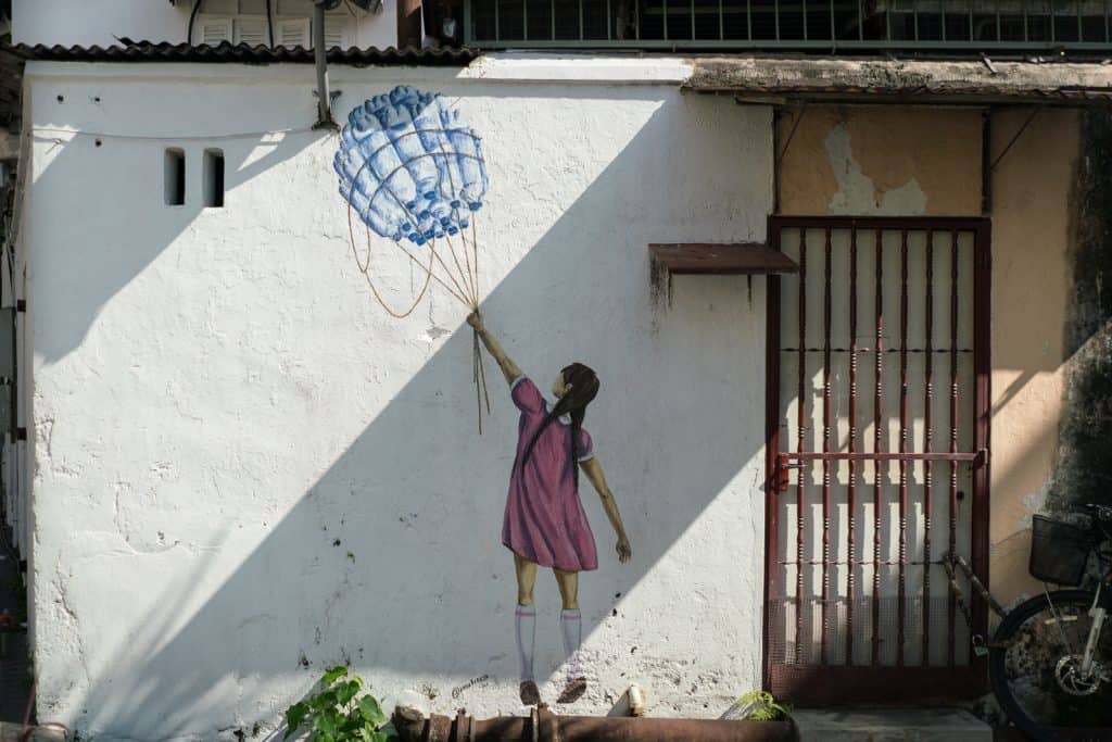 Penang Street Art: Girl with bottle balloon - George Town, Malaysia - 20171218-DSC02911