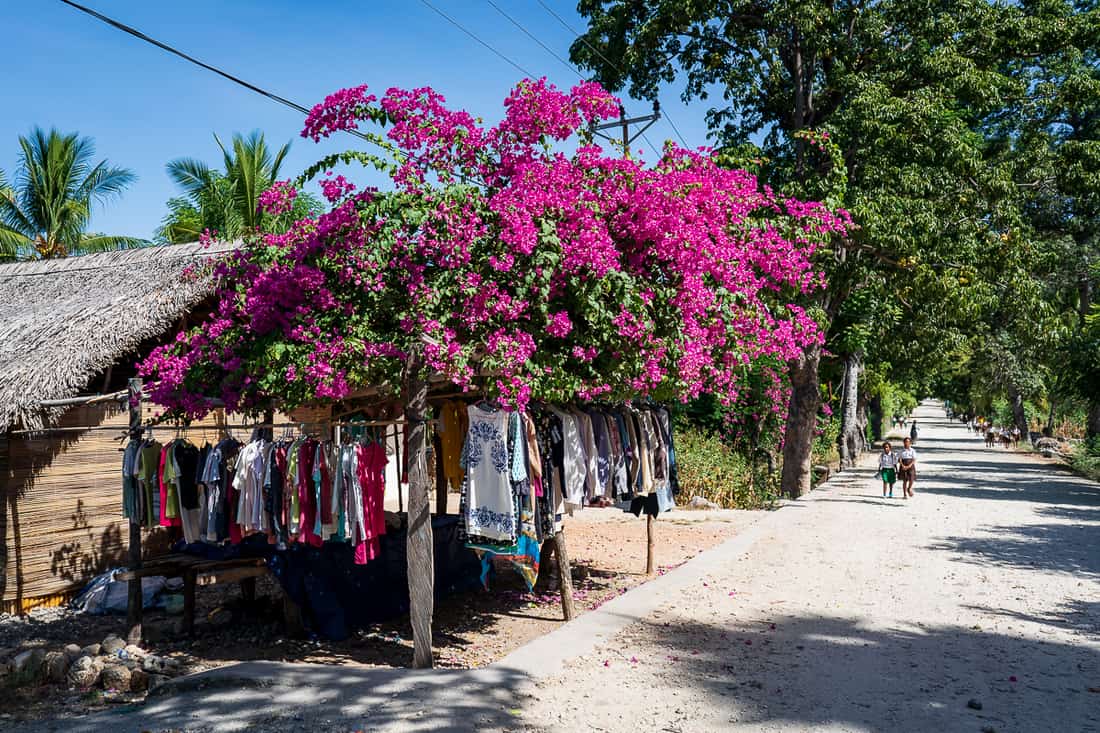 Selling 2nd hand clothes on the Beloi - Vila road, Atauro, East Timor