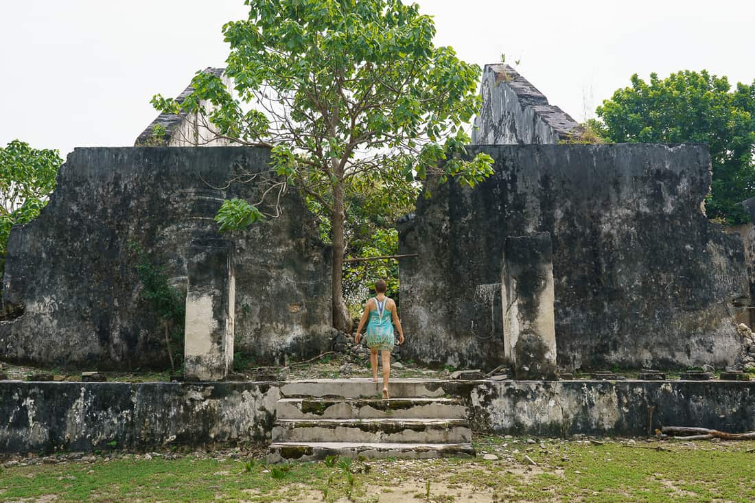 Carola at abandoned Portuguese mansion, Com, East Timor