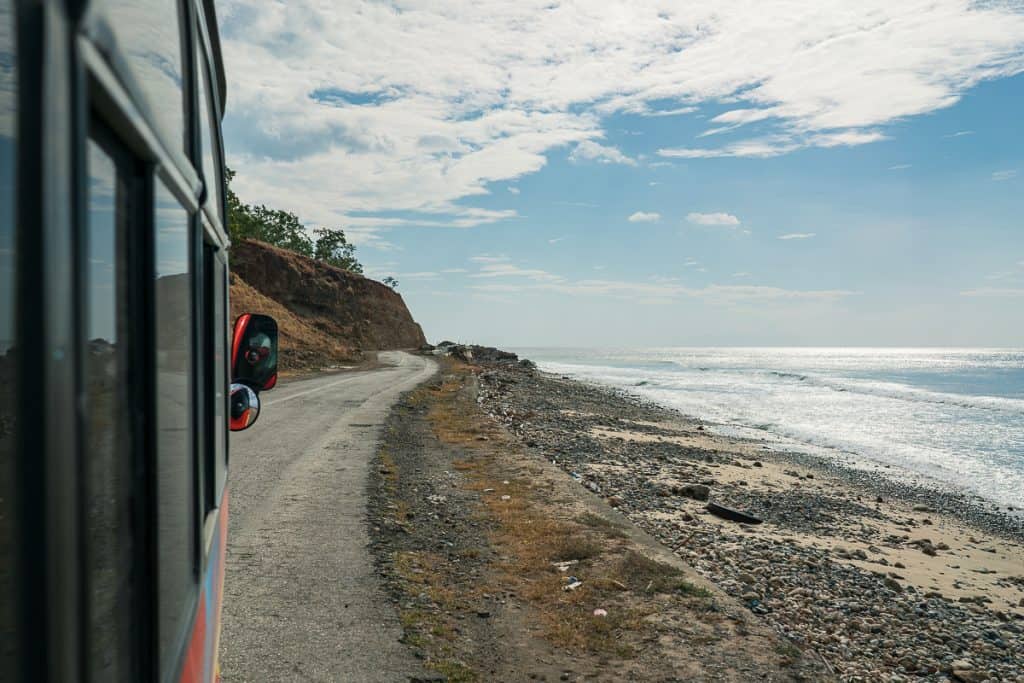 Bus on the road along the beach to Baucau, East Timor