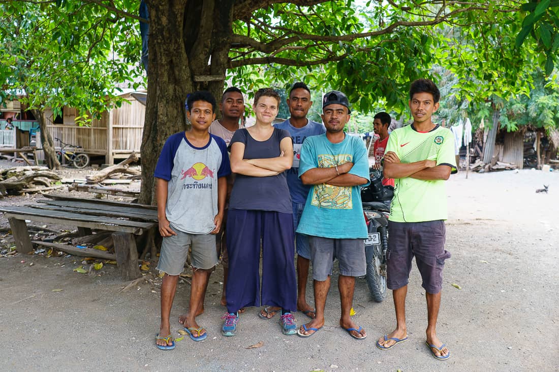 Carola posing with local young men at Suai Loro village, East Timor